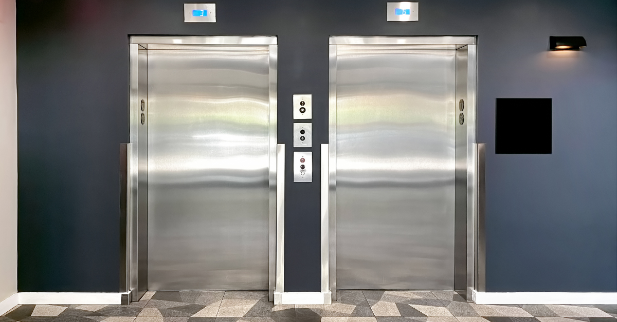 two elevator doors closed in office building